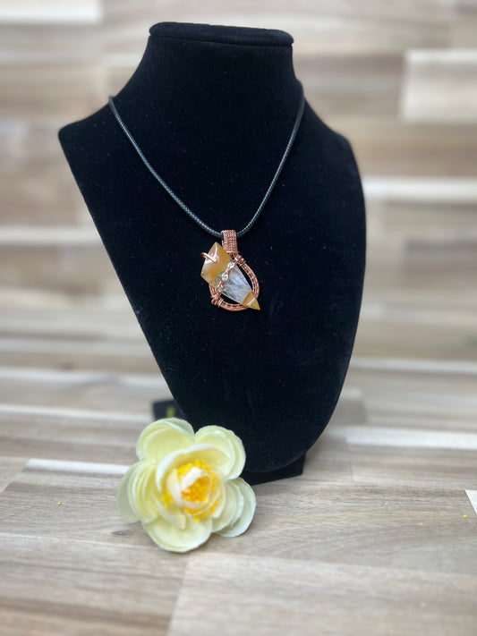 Orange Chalcedony w/ clear facets Pendant